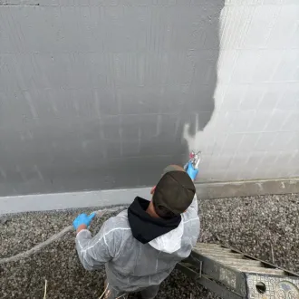 Completed waterproofing membrane on a basement foundation wall — Mariner Construction, Central Maine